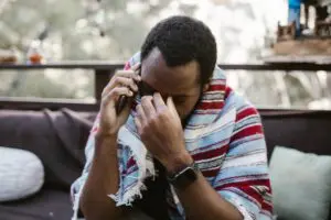 Frustrated man on a cell phone
